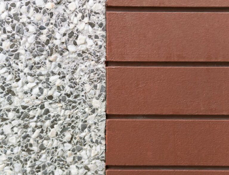 Pebble grey and sage green house exterior