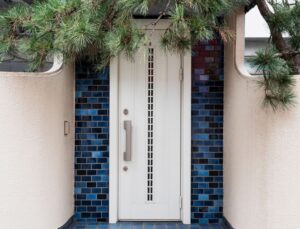 White, Slate & a Single Bold Door 