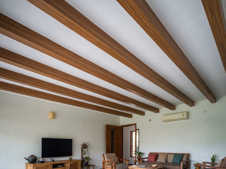 Illustration of a room ceiling with painted faux wood beams against a light background